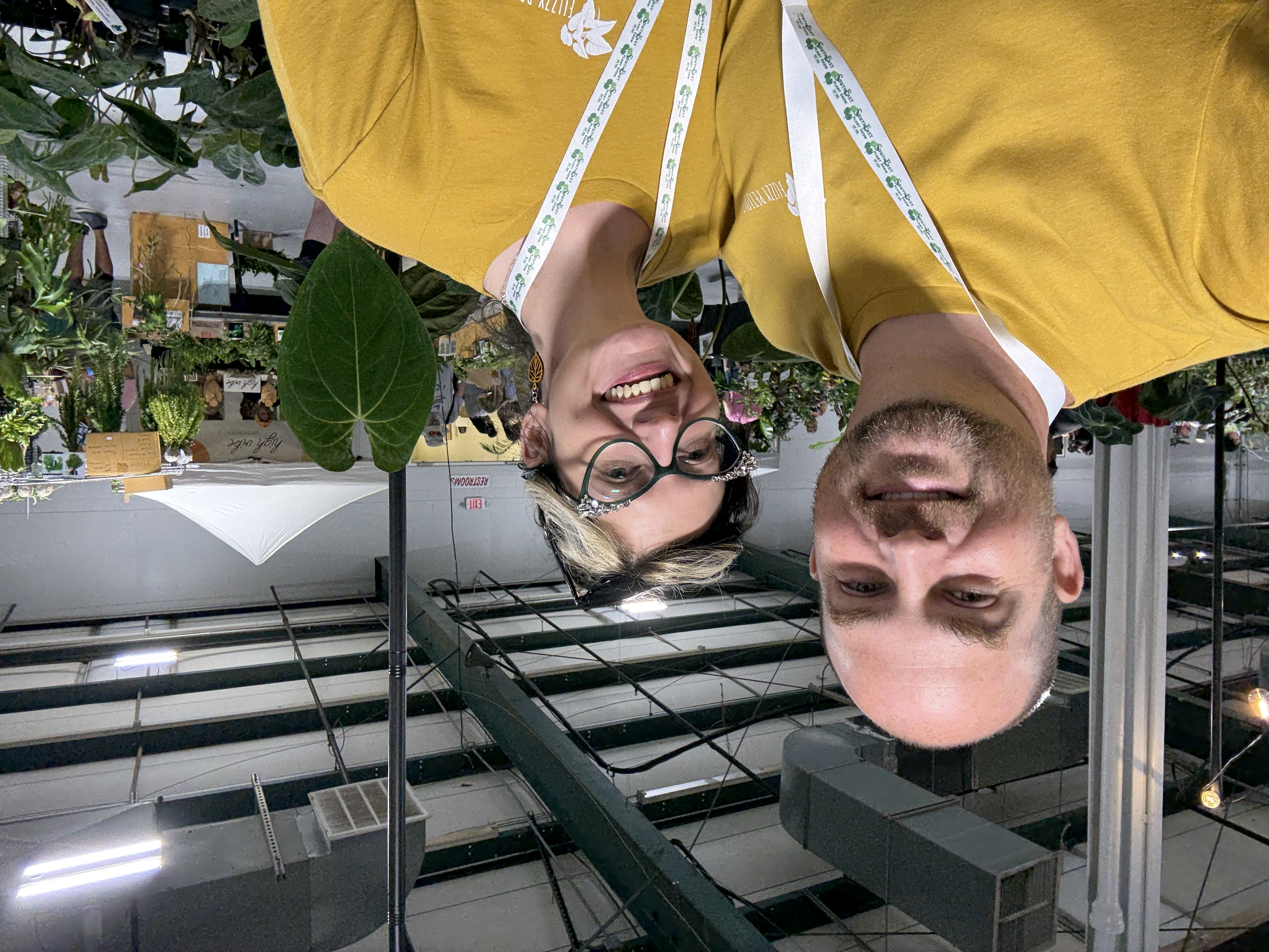 Justin and Sam running a booth at a trade show